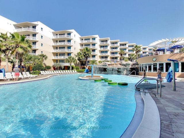 view of swimming pool featuring a patio