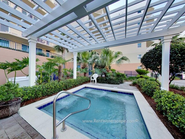 view of pool featuring a pergola