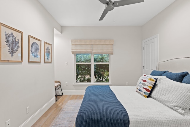 bedroom featuring ceiling fan and light hardwood / wood-style floors