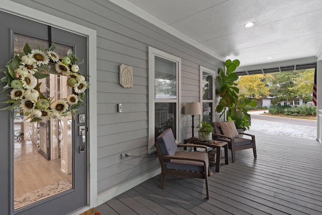 wooden terrace with covered porch