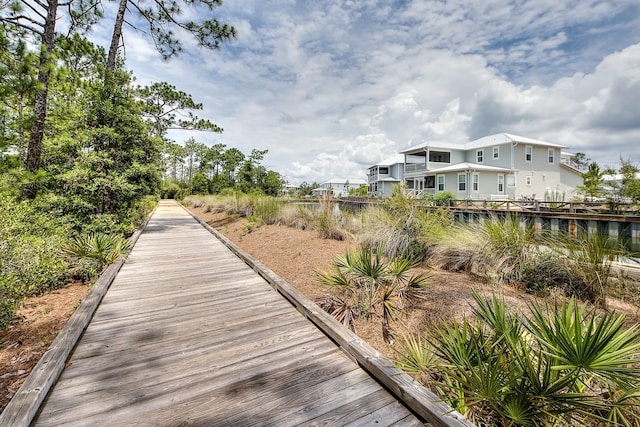 view of home's community featuring a water view