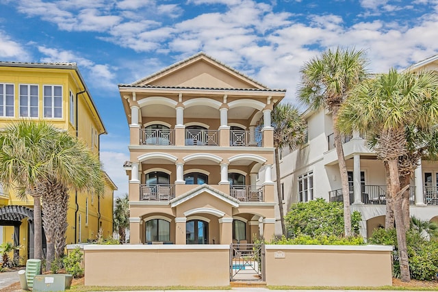 mediterranean / spanish-style house featuring a balcony