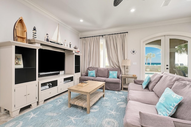 living room with crown molding and french doors