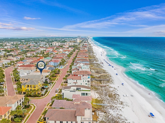 bird's eye view featuring a water view and a view of the beach