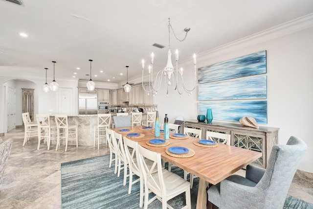 dining area featuring ornamental molding