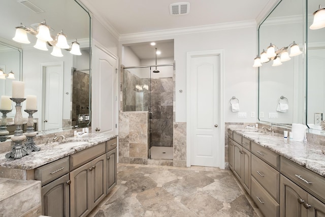 bathroom with crown molding, vanity, and walk in shower