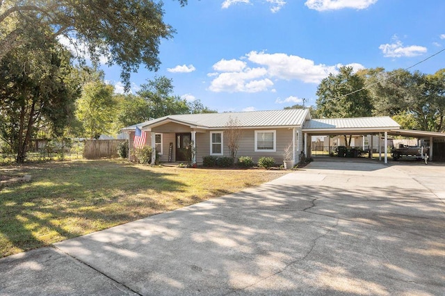 ranch-style home featuring a front lawn