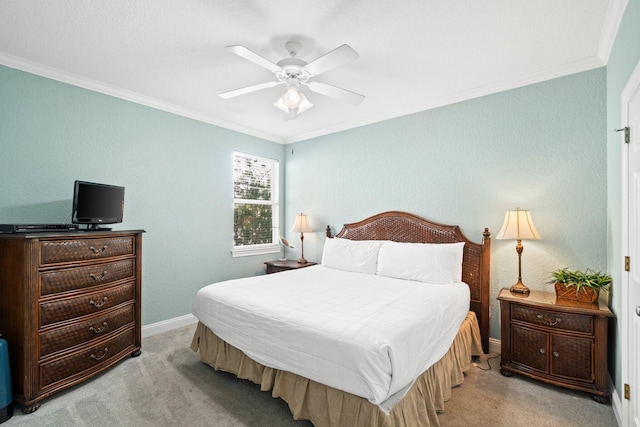 bedroom with ceiling fan, light colored carpet, and ornamental molding