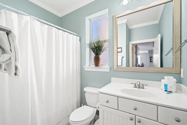 bathroom featuring crown molding, vanity, and toilet