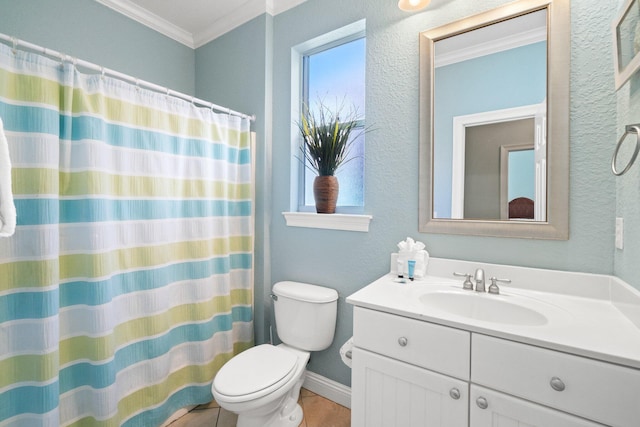 bathroom with tile patterned floors, vanity, ornamental molding, and toilet