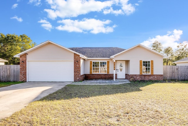 ranch-style house with a garage and a front lawn