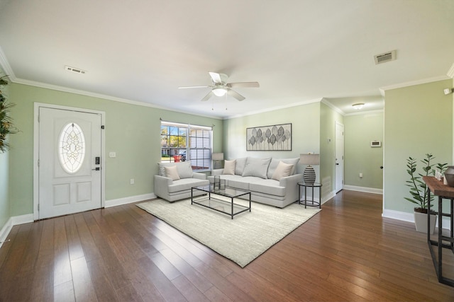 living area with baseboards, dark wood-style flooring, visible vents, and a ceiling fan