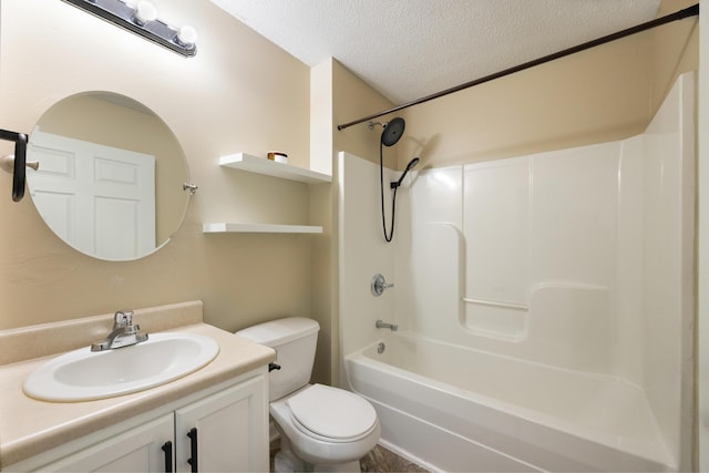 bathroom with shower / bathing tub combination, toilet, vanity, and a textured ceiling