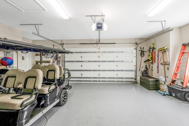 garage featuring a garage door opener