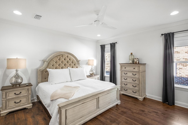 bedroom featuring ceiling fan, dark hardwood / wood-style flooring, and ornamental molding