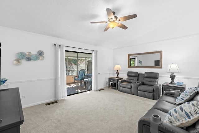 living room featuring light colored carpet, ceiling fan, and lofted ceiling