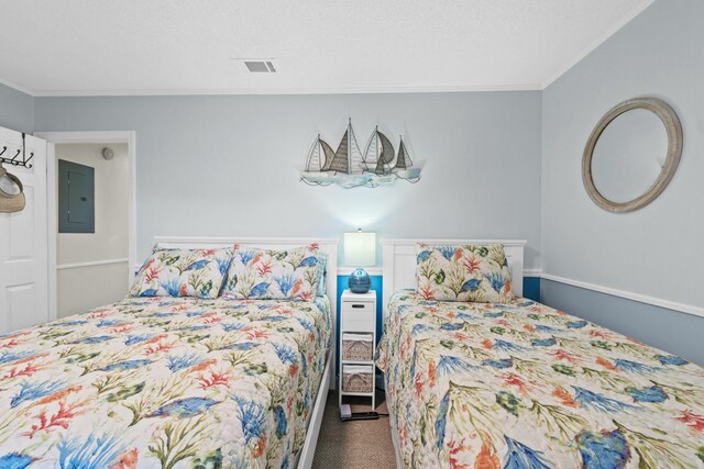 carpeted bedroom featuring electric panel and ornamental molding