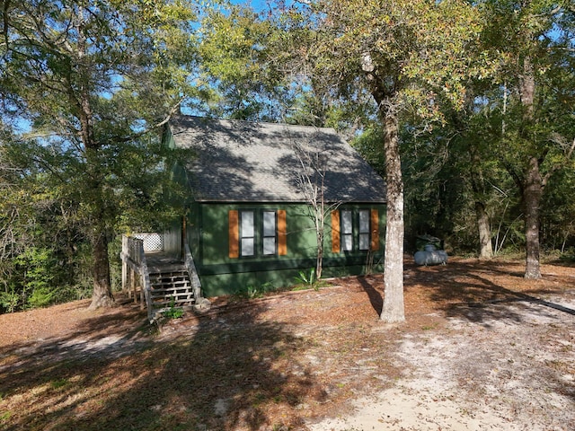 view of front of house featuring a wooden deck