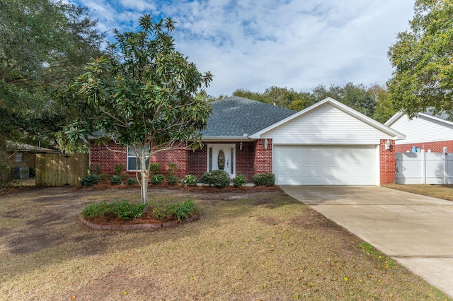 single story home with a garage and a front lawn