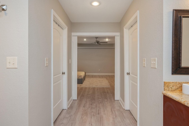 hall featuring light wood-type flooring