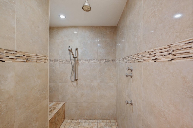 bathroom featuring tiled shower