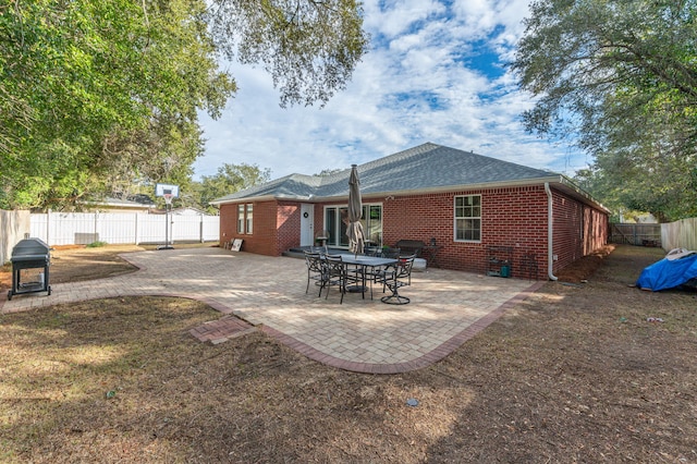 rear view of property with a patio area