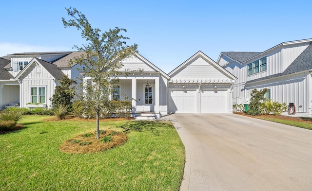 view of front facade with a garage and a front yard