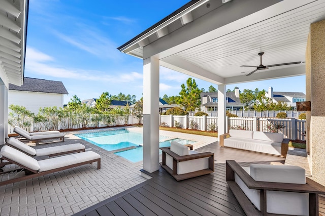 view of swimming pool with an outdoor hangout area and ceiling fan