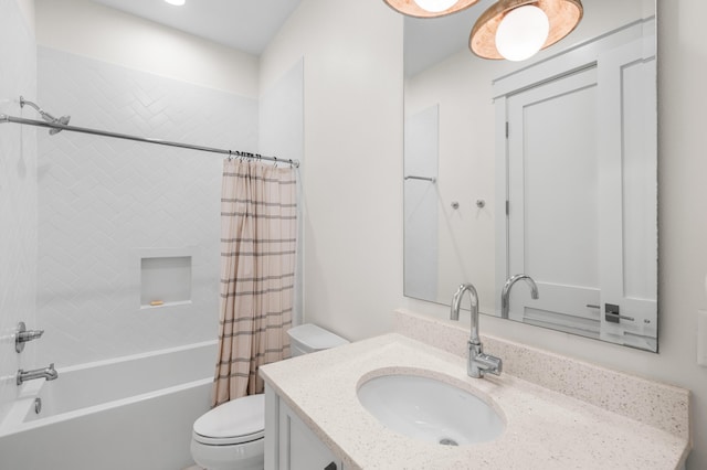 full bath with vanity, toilet, and shower / bath combo with shower curtain