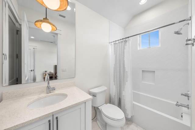 full bathroom featuring vanity, vaulted ceiling, toilet, and shower / bath combo with shower curtain