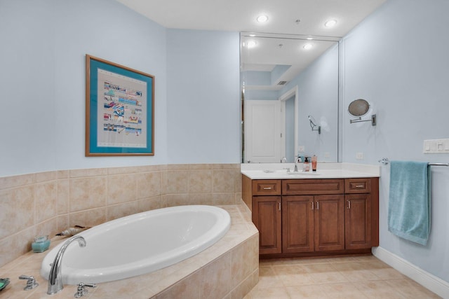 full bath with vanity, tile patterned floors, a bath, and recessed lighting
