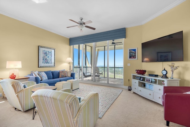 living area with a wall of windows, light colored carpet, ornamental molding, and a ceiling fan