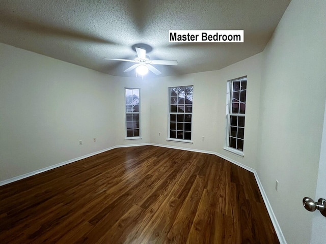 unfurnished room with hardwood / wood-style floors, a textured ceiling, and ceiling fan