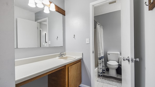 full bathroom with a textured ceiling, vanity, shower / tub combo, and toilet