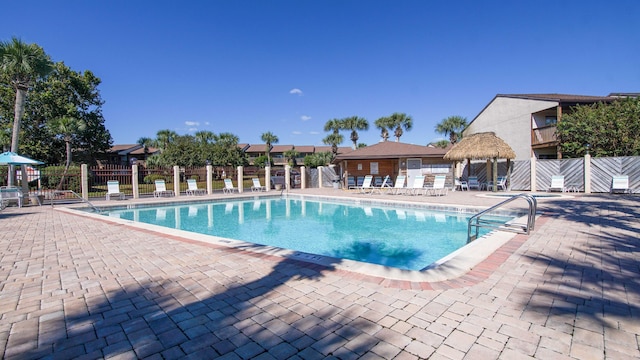 view of pool featuring a gazebo and a patio