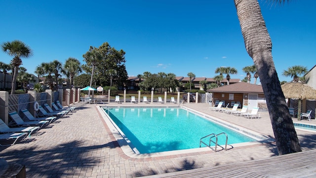 view of swimming pool featuring a patio area