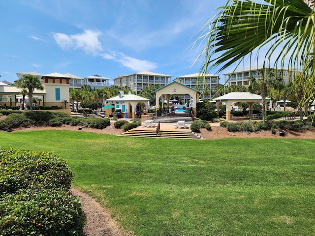 surrounding community featuring a gazebo and a lawn