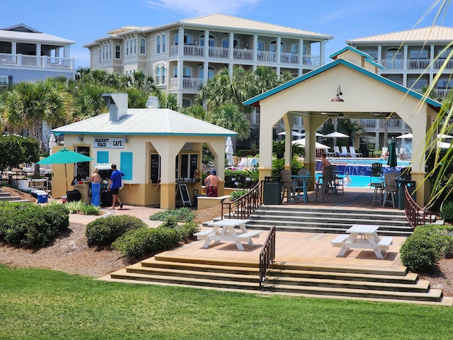 back of house with a gazebo