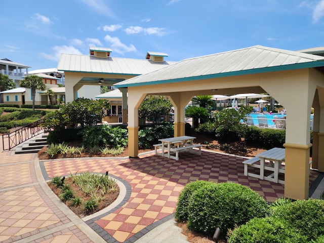 view of patio featuring a gazebo and ceiling fan