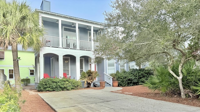 view of front of property with a balcony