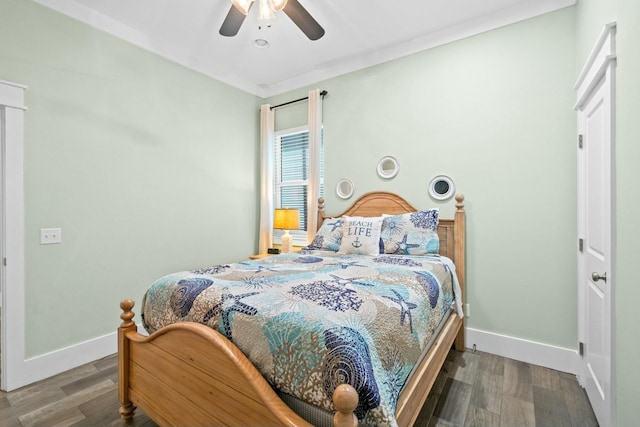 bedroom featuring ceiling fan and wood-type flooring