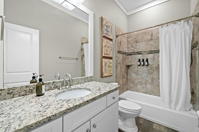 full bathroom with toilet, hardwood / wood-style floors, vanity, and shower / tub combo with curtain