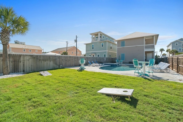 view of yard with a patio area and a pool