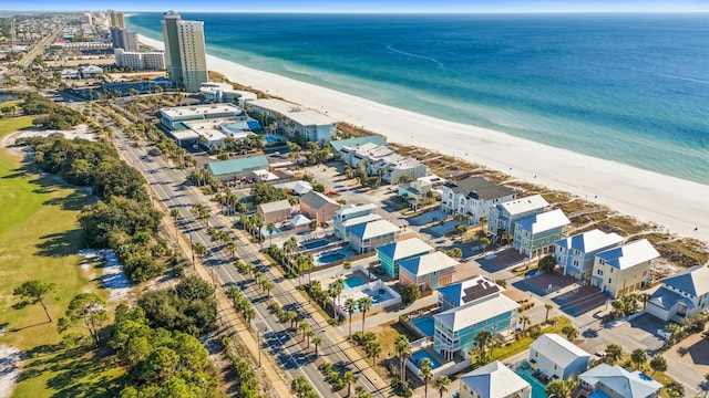 drone / aerial view with a water view and a view of the beach