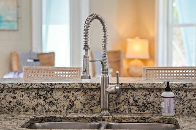 room details with stone countertops and sink