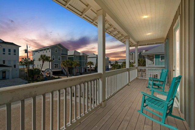 view of balcony at dusk