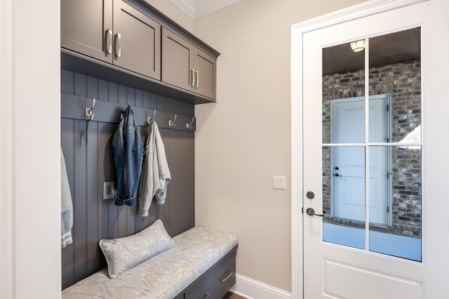 mudroom featuring ornamental molding