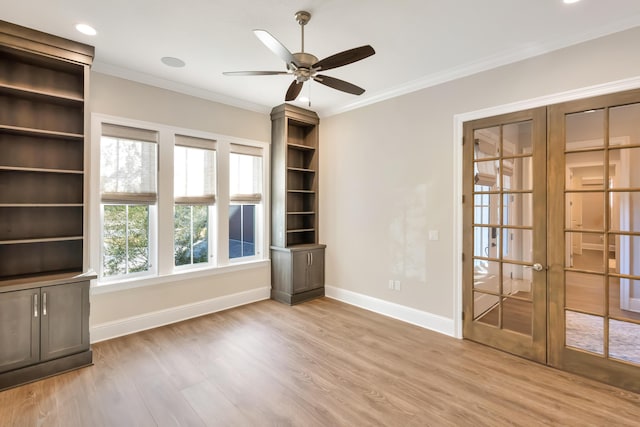 unfurnished living room with french doors, light wood-type flooring, ceiling fan, and ornamental molding