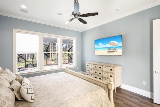 bedroom with dark hardwood / wood-style floors, ceiling fan, and ornamental molding