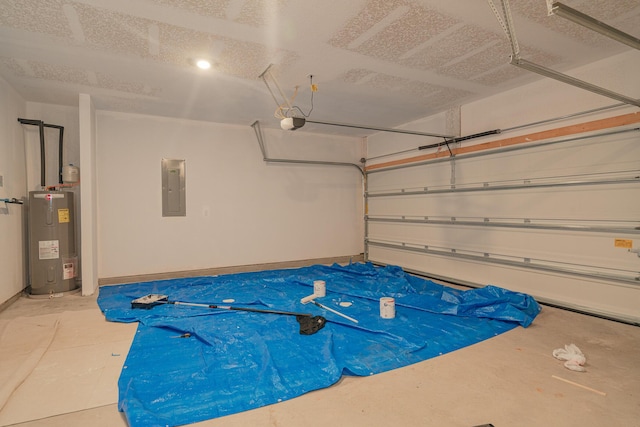 garage featuring a garage door opener, electric panel, and water heater